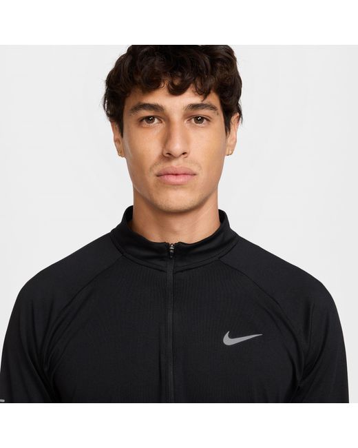 Nike Black Stride Dri-Fit 1/4-Zip Running Top for men
