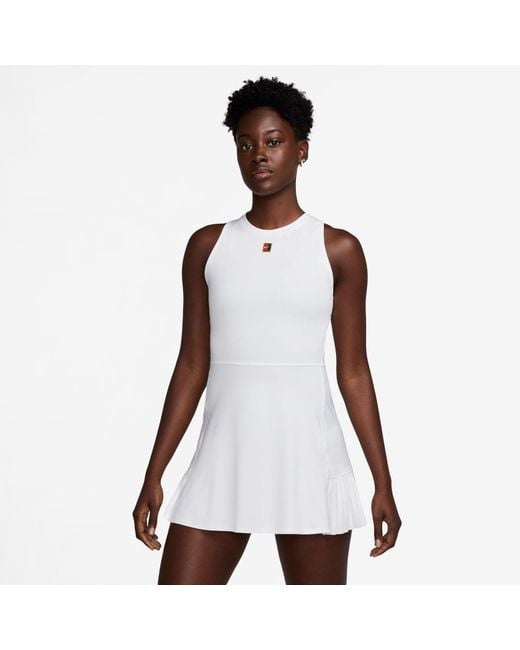 nike ladies tennis dresses Women's Dri-FIT Advantage Dress (Black/White) XS It features a scoop neckline Nike Womens Team Victory Dress