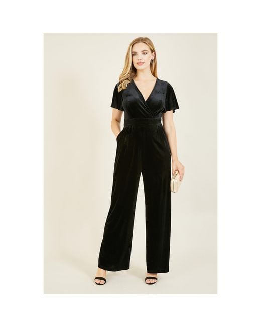 Yumi' Black Jumpsuit With Angel Sleeves