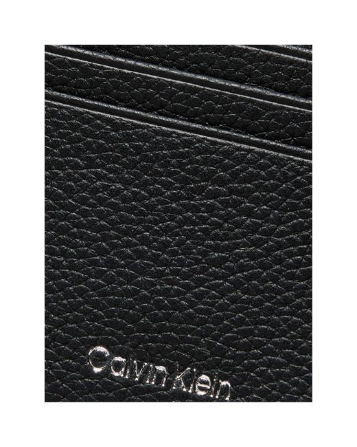 Calvin Klein Black Foil Embossed Logo Leather Card Case for men