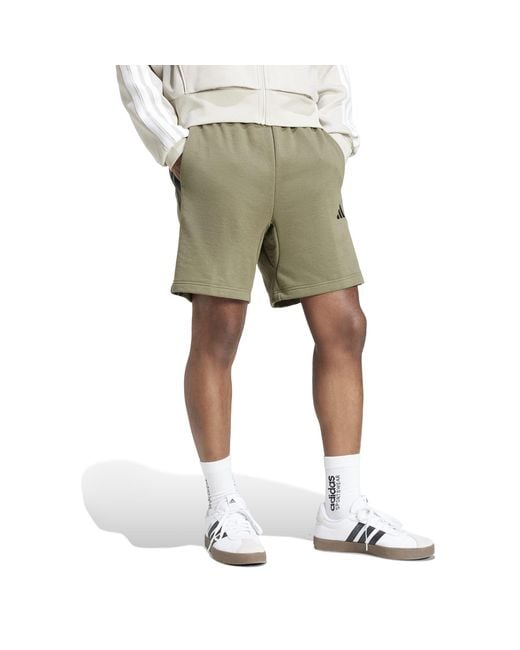 Adidas Green Essentials 3 Stripe Fleece Shorts for men