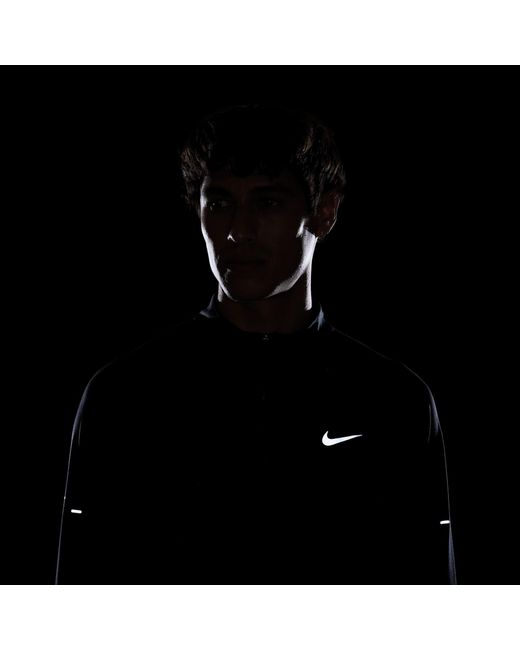 Nike Black Stride Dri-Fit 1/4-Zip Running Top for men