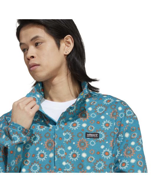 Adidas Originals Blue Lightweight Three-Stripe Windbreaker for men