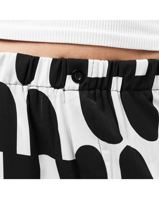 AX Paris Black And Cream Printed Geometric Trousers