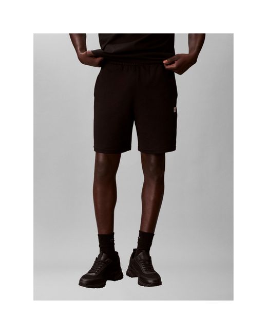 Calvin Klein Black Woven Badge Fleece Jogger Shorts for men