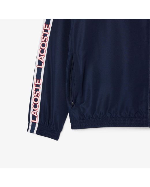 Lacoste Blue Colour Block Logo Stripe Tennis Jacket for men