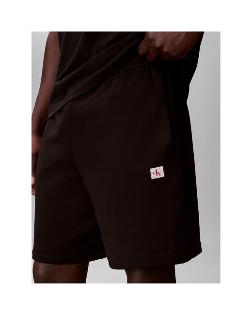 Calvin Klein Black Woven Badge Fleece Jogger Shorts for men
