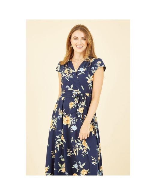 Mela London Blue Floral Print Dipped Hem Wrap Dress