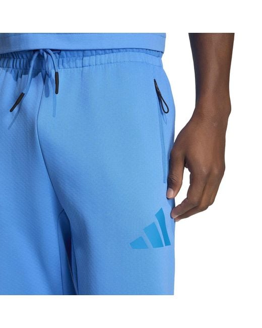 Adidas Blue Z.N.E. Tapered-Fit Tracksuit Bottoms for men