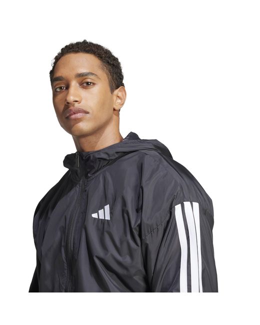 Adidas Black Essentials Stripes Lightweight Mesh Lined Windbreaker for men