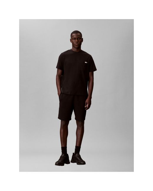 Calvin Klein Black Woven Badge Fleece Jogger Shorts for men