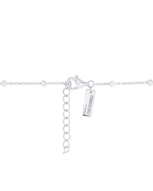 Common Lines Metallic Studded Cross Ball Bracelet