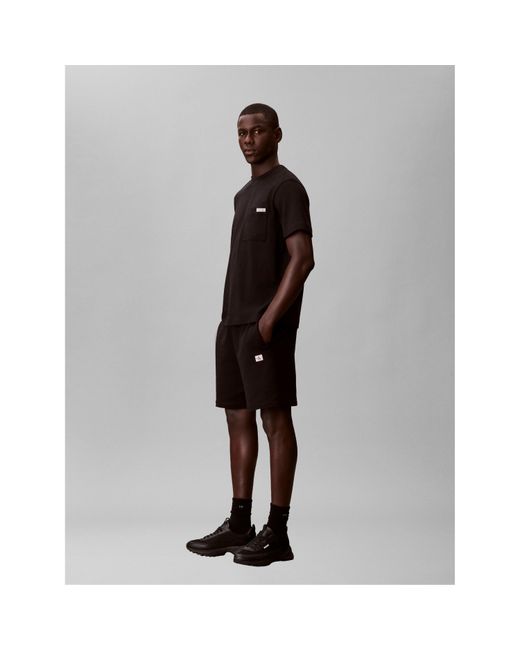 Calvin Klein Black Woven Badge Fleece Jogger Shorts for men