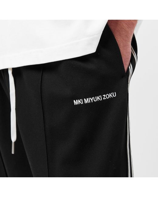 MKI Miyuki-Zoku Black Wide Fit Open Hem Woven Tracksuit Joggers for men