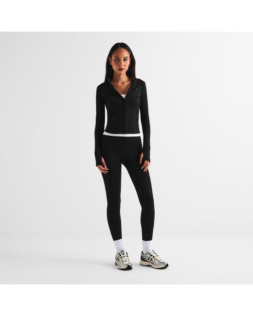 The Couture Club Black Sculpting Stretch Crossover Leggings