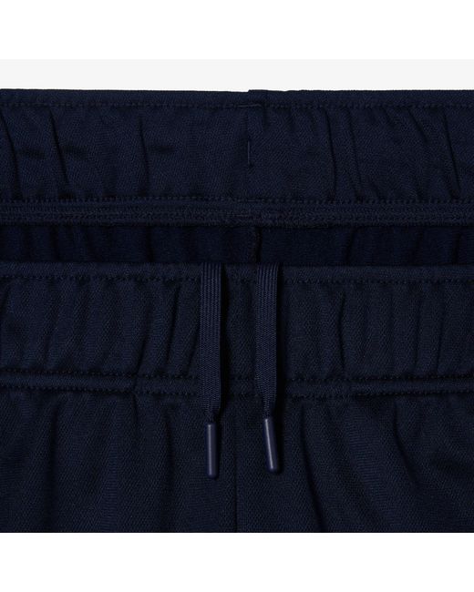 Lacoste Blue Tsuit Trousers for men