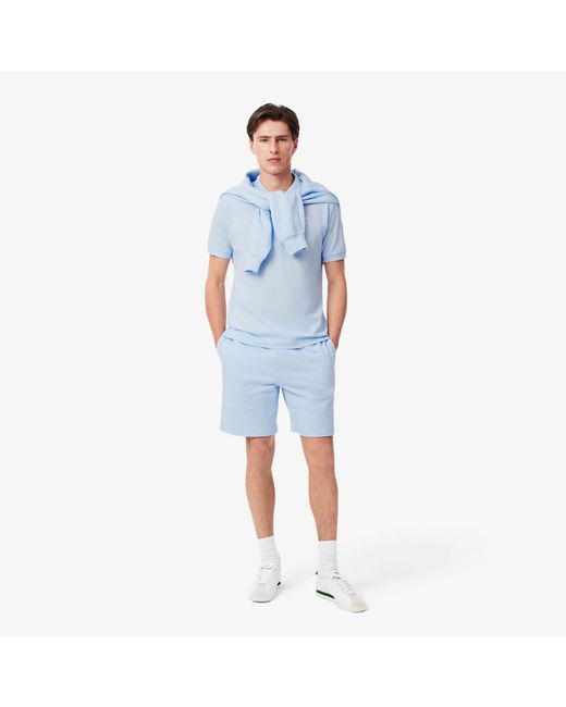 Lacoste Blue Classic Fit Signature Print L.12.12 Polo Shirt for men