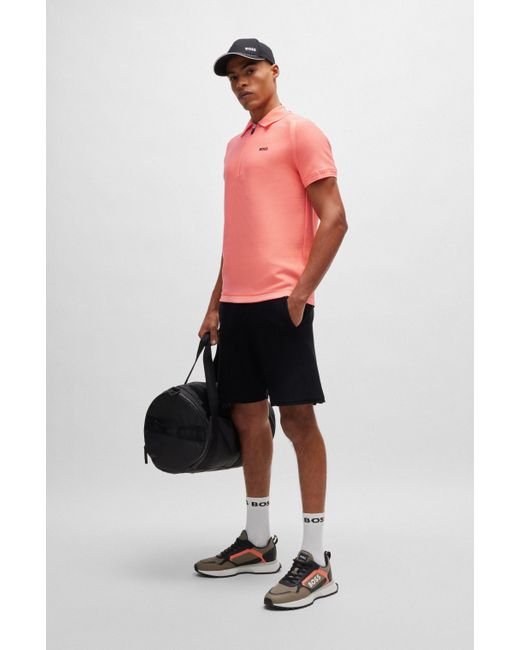Polo à manches courtes avec encolure zippée et logo Boss pour homme en coloris Pink