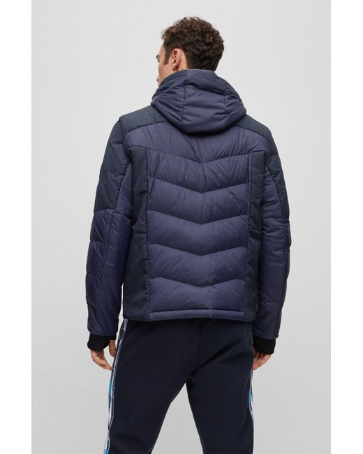 BOSS by HUGO BOSS Mixed-material Down Jacket With Detachable Sleeves And  Hood in Blue for Men | Lyst Canada