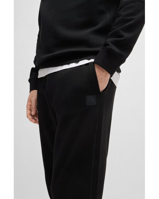 Boss Black Cotton-terry Tracksuit Bottoms With Logo Patch for men