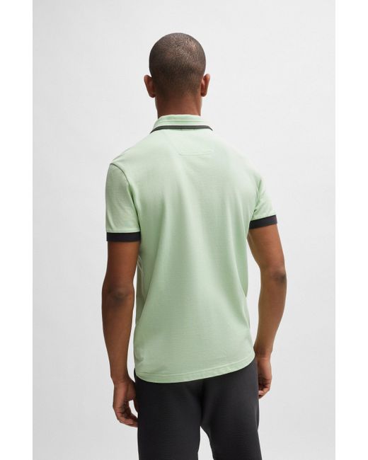 Boss Poloshirt aus Baumwoll-Piqué mit kontrastfarbenen Streifen und Logo in Green für Herren