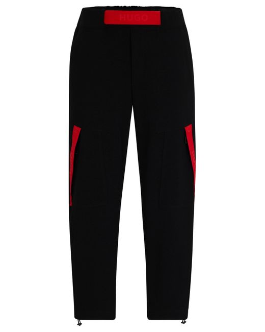 HUGO Relaxed-Fit Jogginghose mit rotem Logo-Tape in Black für Herren