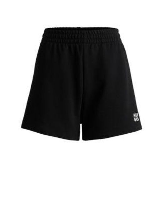 Short Regular Fit en molleton de coton avec logo revisité HUGO en coloris Black