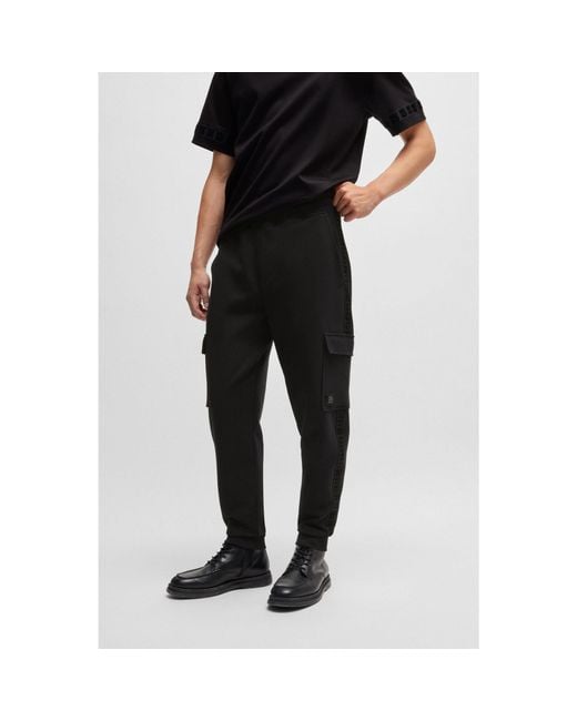 HUGO Black Stretch-Cotton Tracksuit Bottoms With Stacked Logo for men