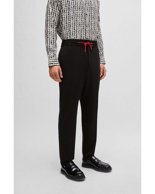 Pantalon Extra Slim Fit en jersey stretch performant avec cordon de serrage HUGO pour homme en coloris Gris Lyst