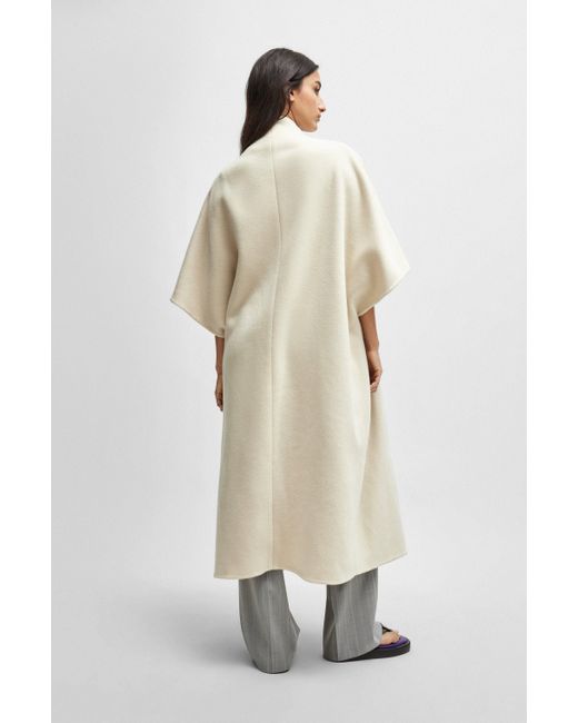 Manteau en laine vierge NAOMI x avec drapé en cascade sur le devant Boss en coloris Natural