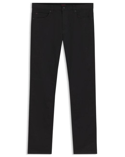 Jean Slim en denim stretch noir intense HUGO pour homme en coloris Black