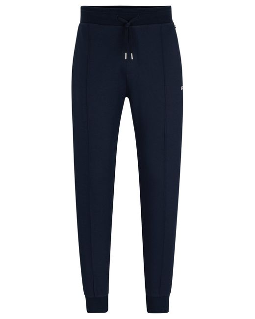 Boss Blue Cuffed Tracksuit Bottoms With Embroidered Logo for men