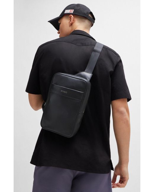 HUGO Black Logo-trim Backpack In Perforated Faux Leather for men