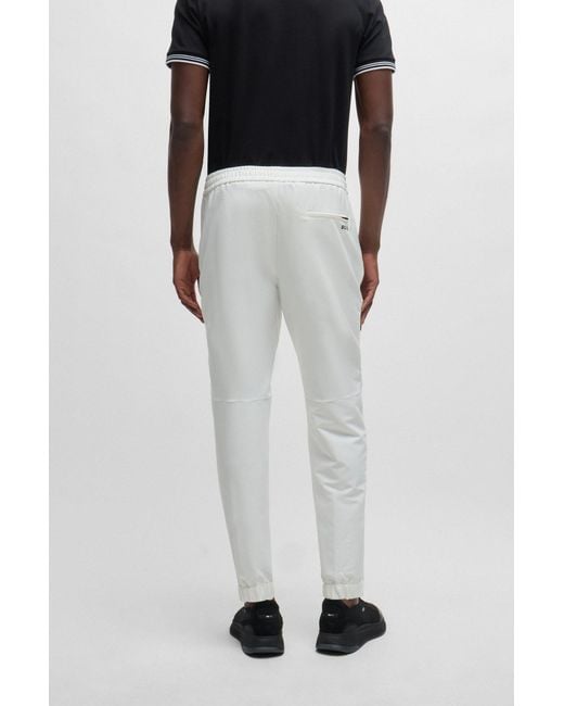Boss White Tapered-fit Chinos In Easy-iron Four-way Stretch Fabric for men