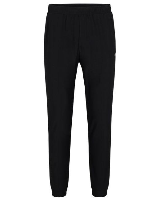 Boss Black Tracksuit Bottoms In Stretch Fabric With Decorative Reflective Logo for men