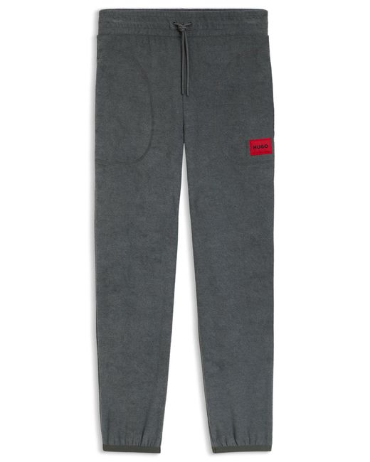 HUGO Relaxed-Fit Trainingsbroek Van Fleece Met Rood Logolabel in het Gray voor heren