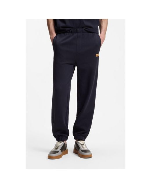 HUGO Blue Cotton-Terry Tracksuit Bottoms With Logo Badge for men