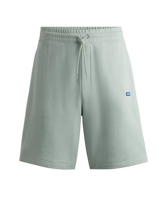 HUGO Green Cotton-terry Shorts With Blue Logo Patch for men