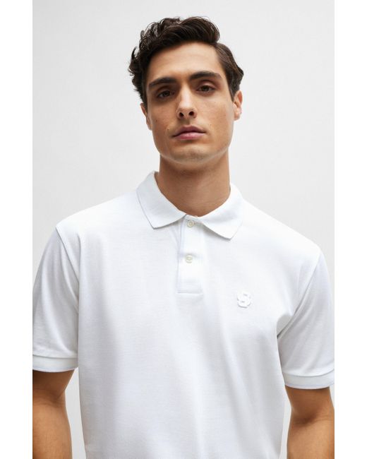 Boss Poloshirt aus merzerisierter Baumwolle mit gesticktem Doppel-Monogramm in White für Herren