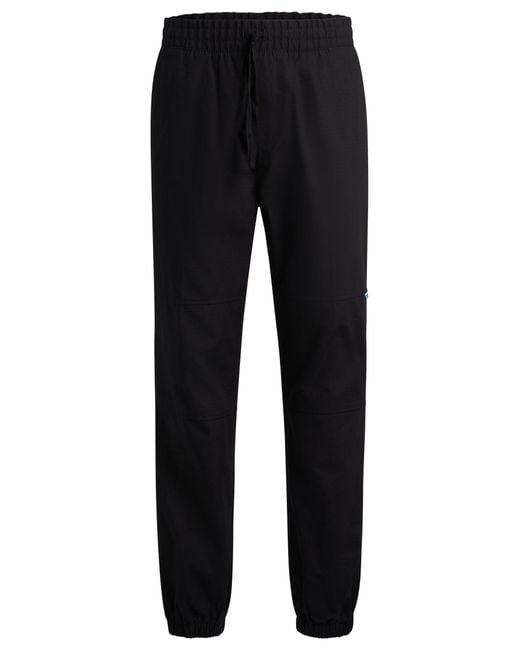 HUGO Blue Tapered-fit Trousers In Structured Cotton for men