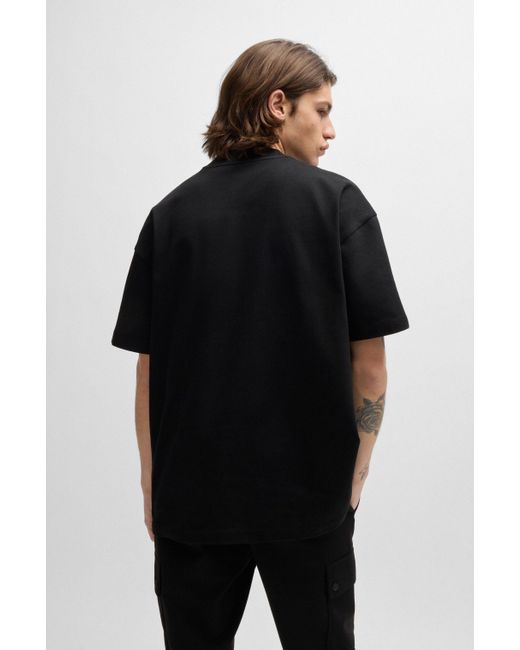 HUGO Oversized-fit Katoenen T-shirt Voor Alle Genders Met Logolabel in het Black voor heren
