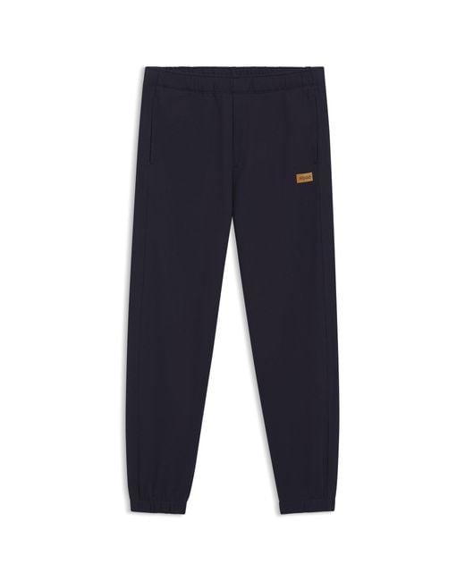 HUGO Blue Cotton-Terry Tracksuit Bottoms With Logo Badge for men