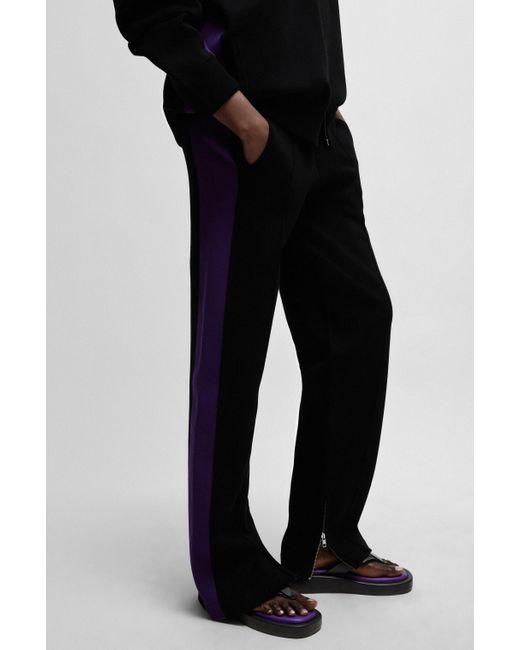 Pantalon en maille NAOMI x à rayures contrastantes sur les côtés Boss en coloris Black