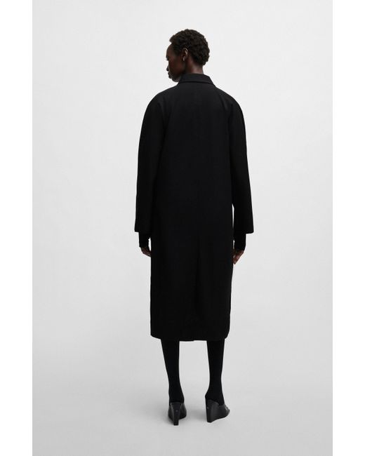 Manteau déperlant en laine vierge NAOMI x Boss en coloris Black