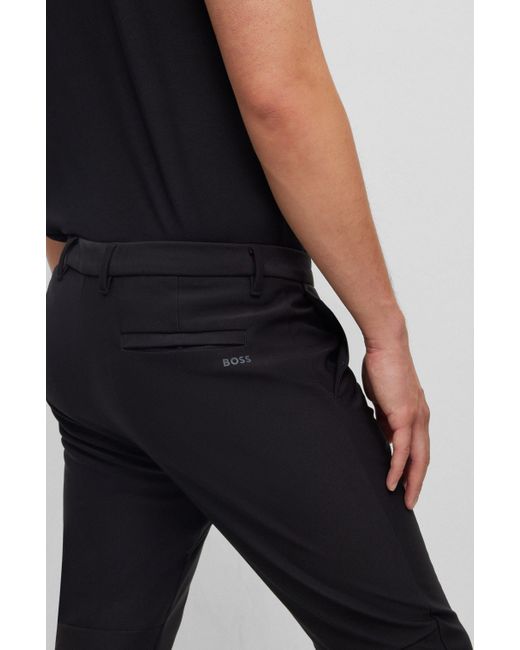 Pantalon Slim Fit en matière softshell imperméable Boss pour homme en coloris Black