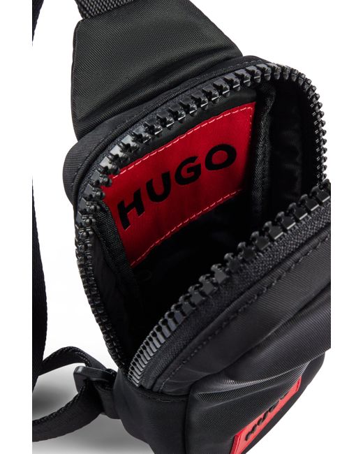 HUGO Mini-Rucksack mit rotem Logo-Aufnäher in Black für Herren