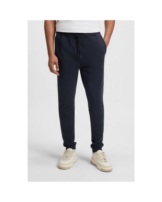 Boss Blue Cotton-Terry Tracksuit Bottoms With Logo Patch for men