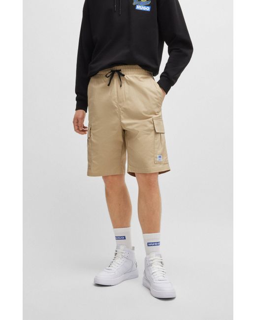 HUGO Shorts aus strukturierter Baumwolle mit Tunnelzug und Logo-Aufnäher in Natural für Herren