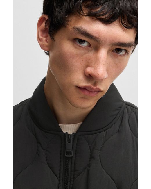 HUGO Black Water-Repellent Quilted Jacket With Logo Badge for men
