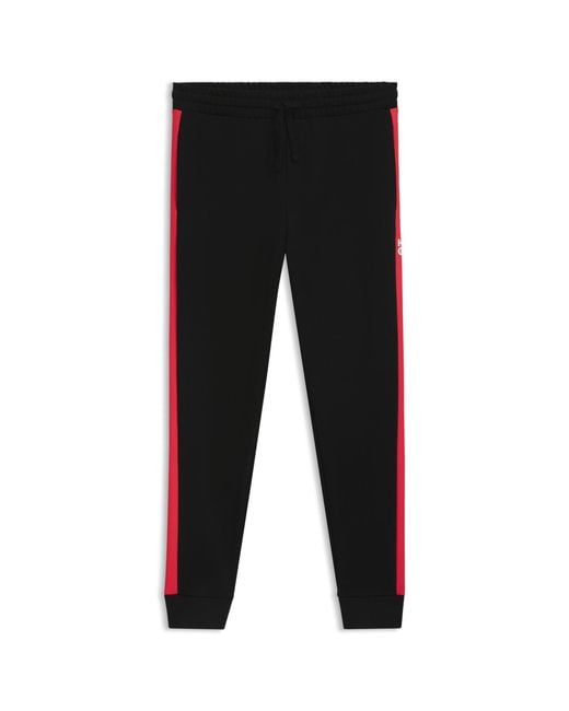 HUGO Black Cotton-Terry Tracksuit Bottoms With Contrast Side Stripes for men